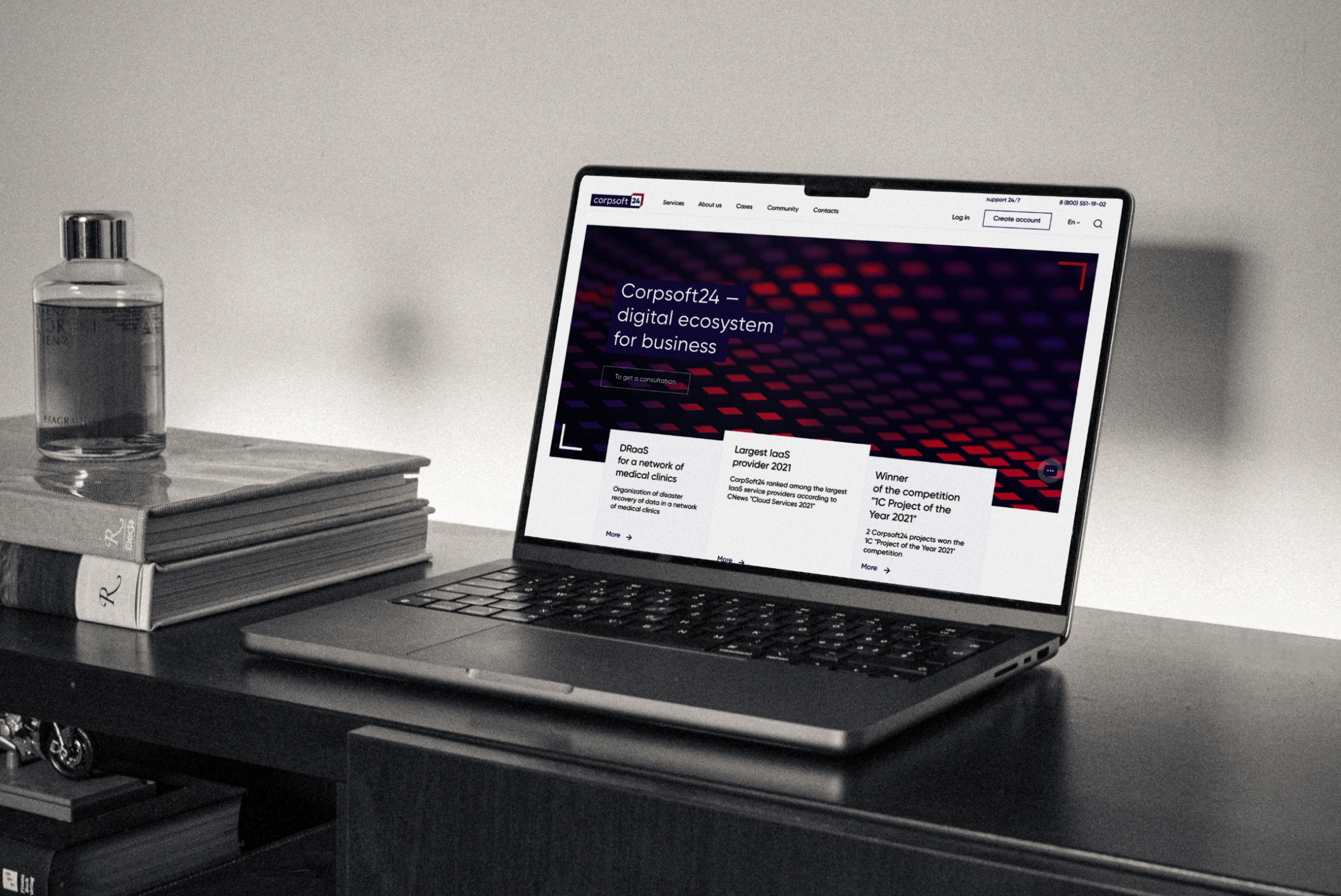 Corpsoft24 corporate website displayed on a laptop