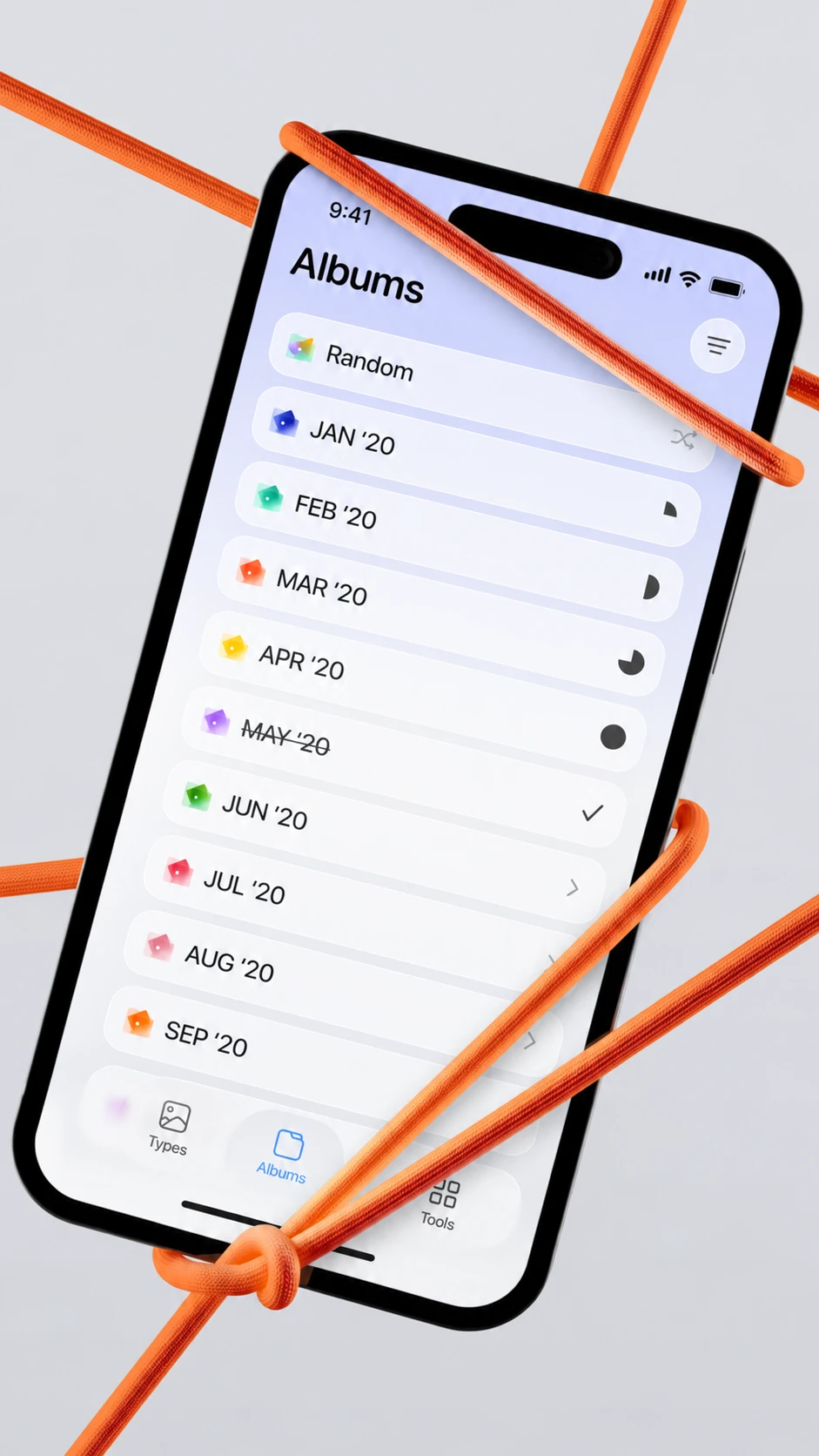Master Swiper Albums screen on a phone tied with orange cords